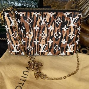 Louis Vuitton jungle collection crossbody/clutch